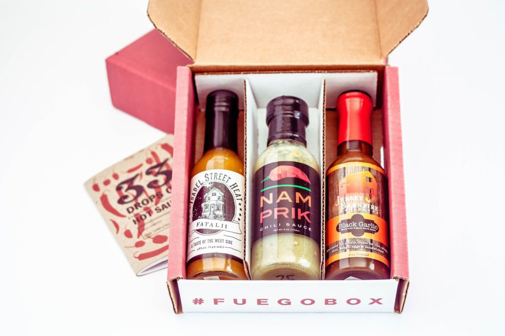 Fuego Box hot sauces with tasting book
