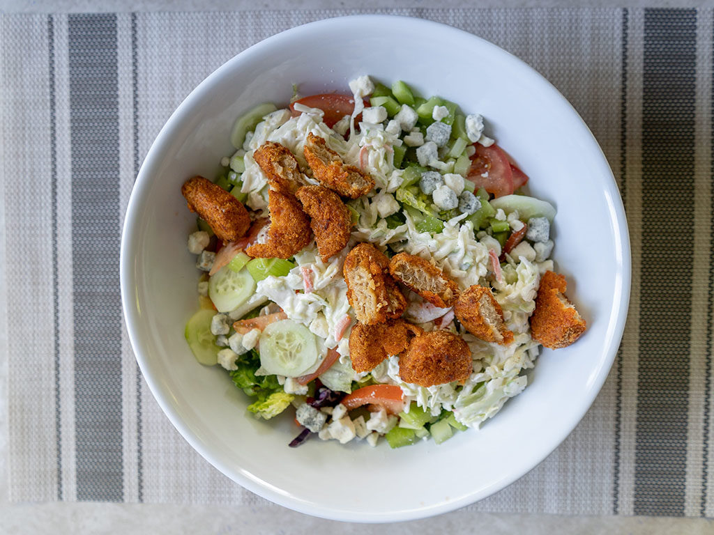 Buffalo salad with MorningStar Farms chickn nuggets