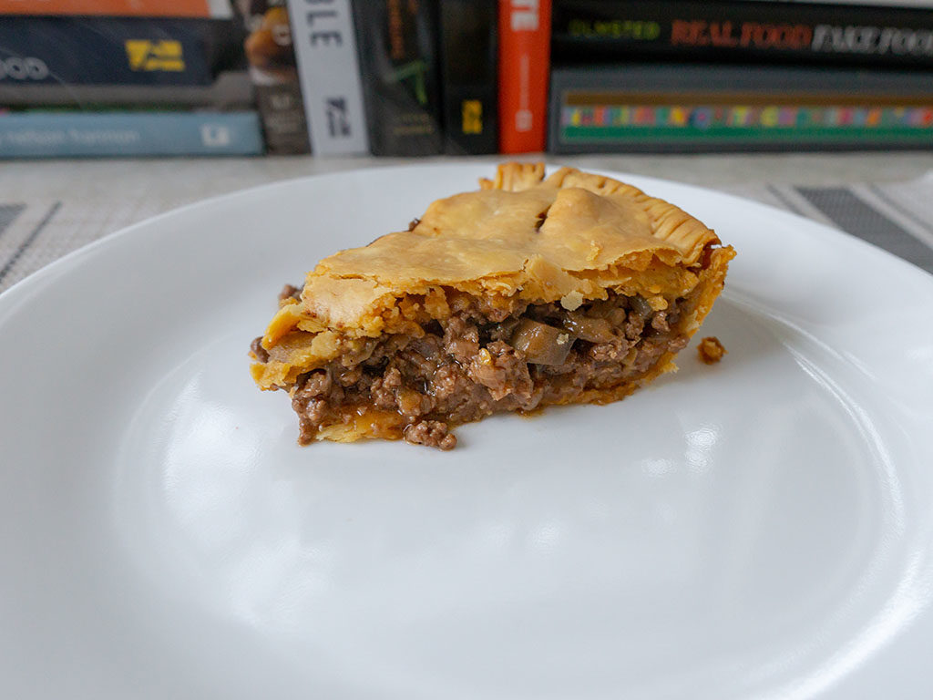 British beef and onion pie - slice just five minutes out of oven