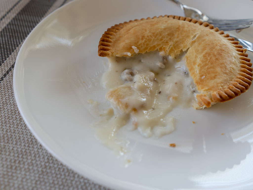 Banquet Sausage And Gravy Deep Dish pot pie cooked side view