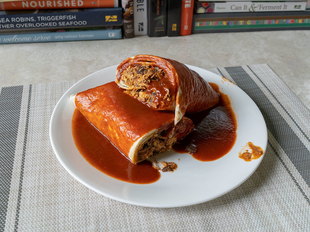 Rotisserie chicken enchilada with rosarita enchilada sauce