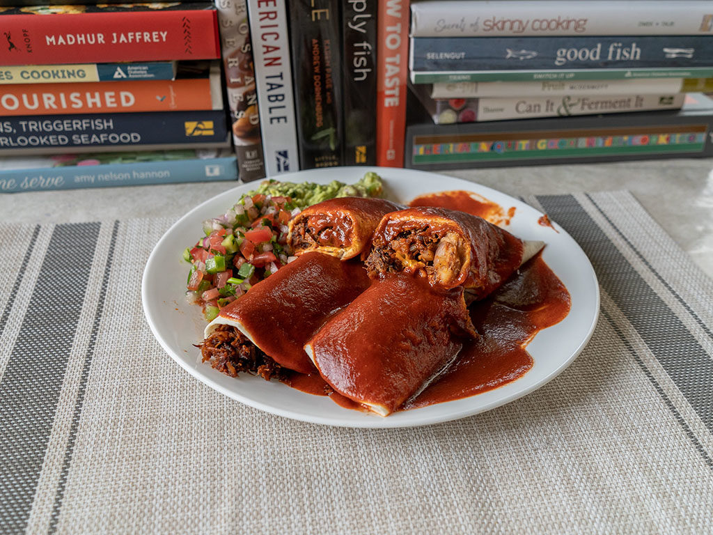 Rotisserie chicken enchilada with rosarita enchilada sauce