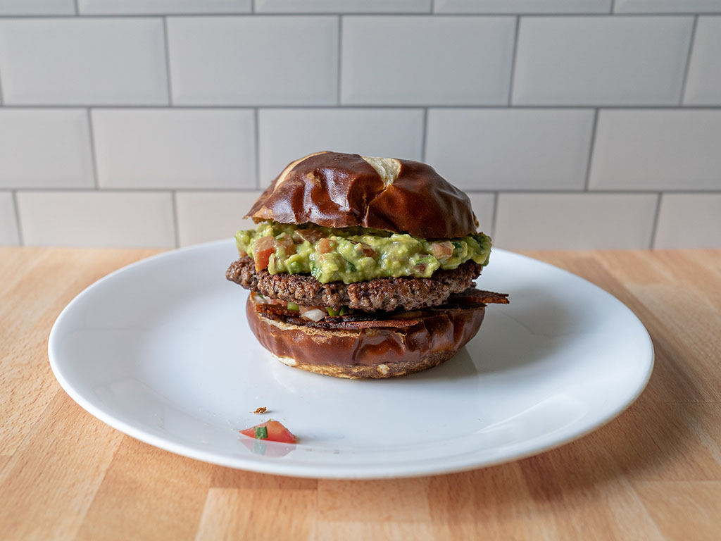 Impossible Burger with guacamole and sweet earth air fried bacon