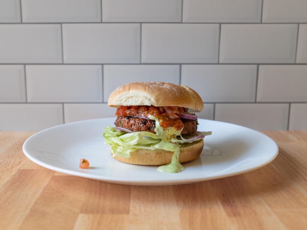 365 Plant-Based Burger Patties cooked with salsa