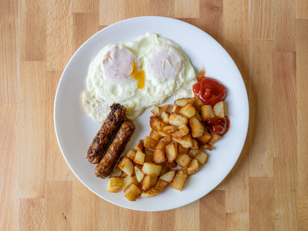 Beyond Breakfast Sausage Links cooked with eggs and breakfast potatoes