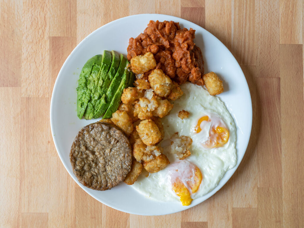 Simple Truth Meatless Breakfast Patties with eggs, avocado beans and tater tots