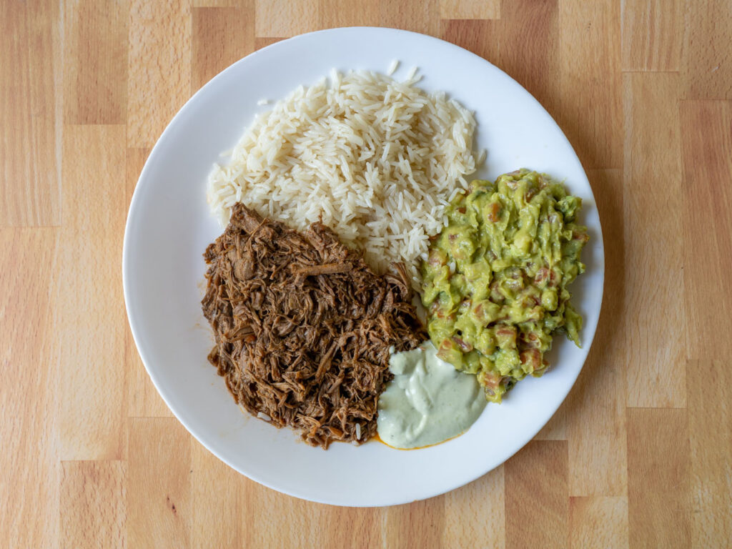 Del Real Barbacoa cooked with rice and guacamole